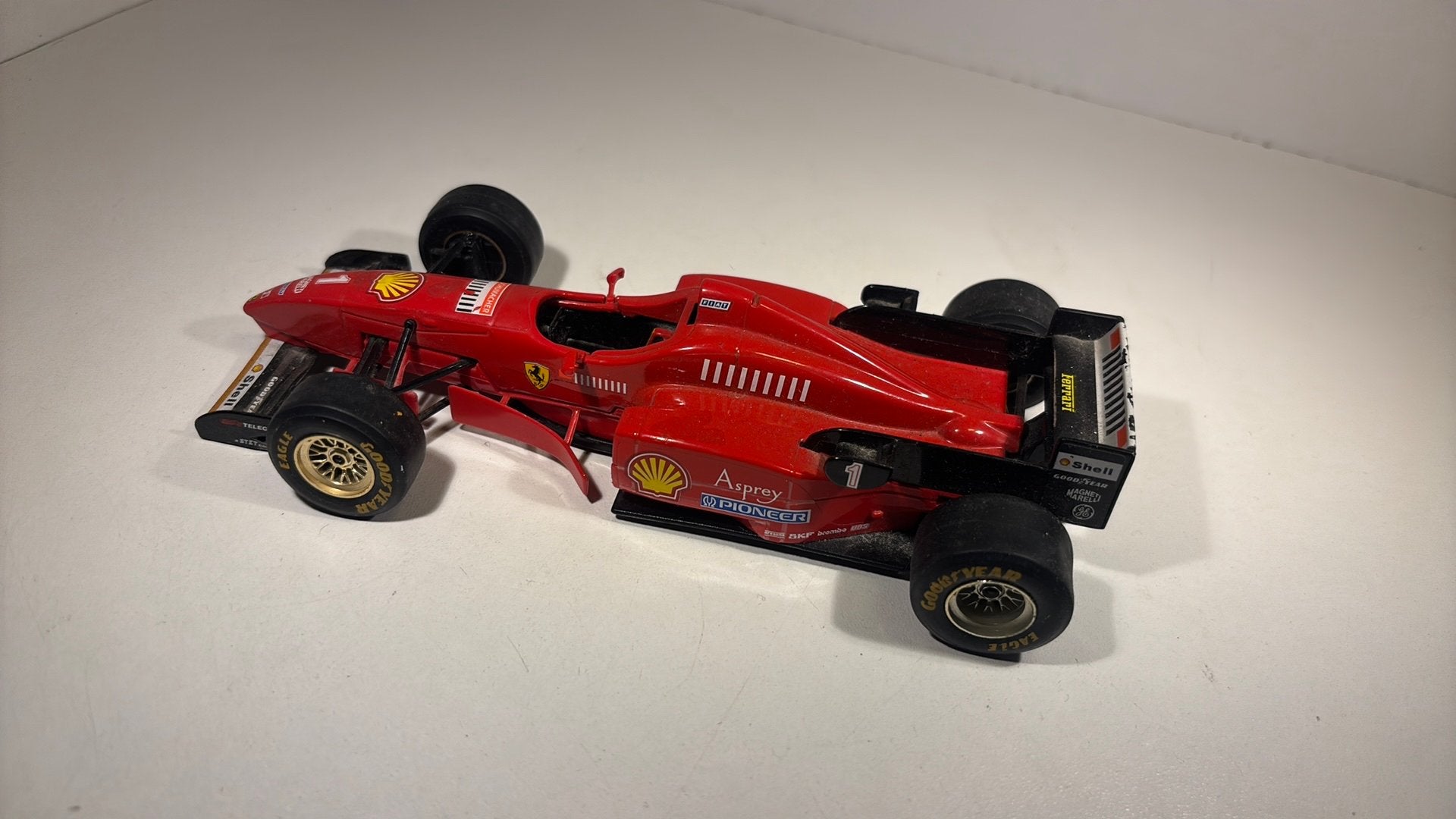 F1 Ferrari f310 m. Schumacher Bburago 1.24, Ophalen of Verzenden, Bburago, A, A