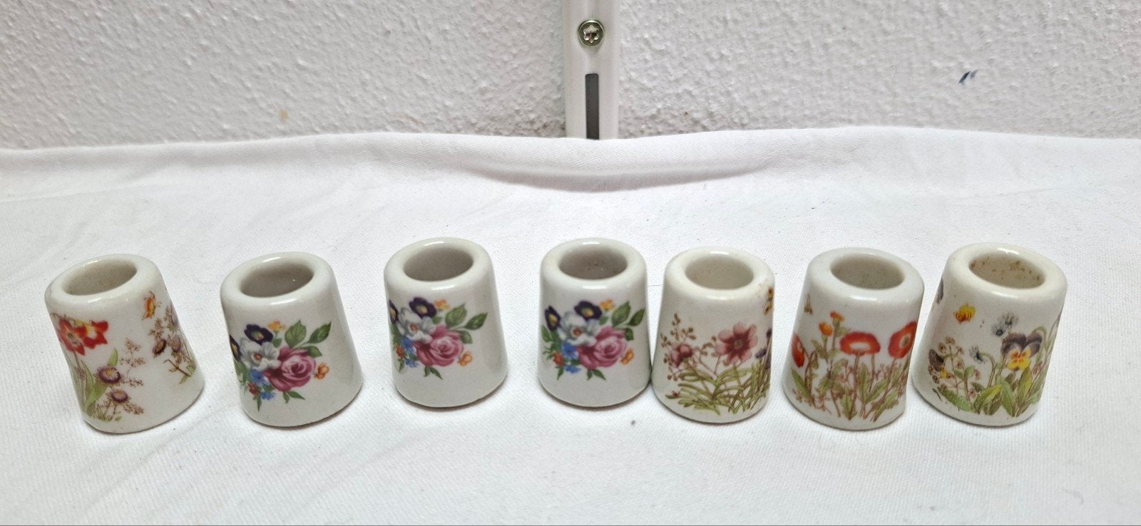 7 porseleinen minikandelaars of vingerhoedkandelaars, Antiek en Kunst, Ophalen of Verzenden