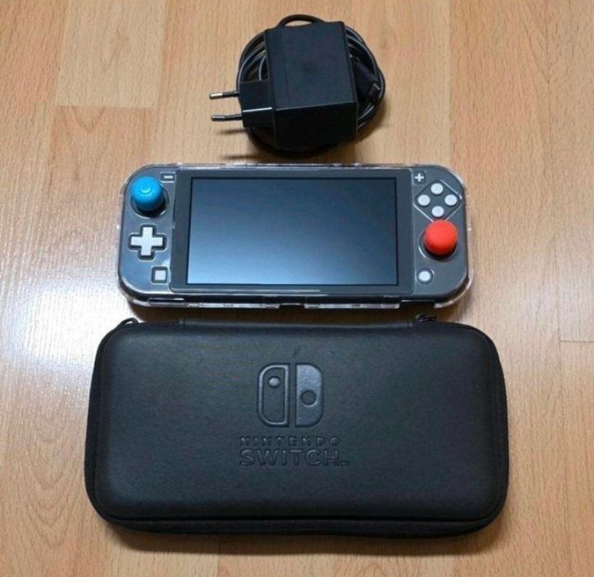 Nintendo Switch Lite Grijs met hoes en oplader, Ophalen of Verzenden, Grijs, Gebruikt, Met beschermhoes of tas