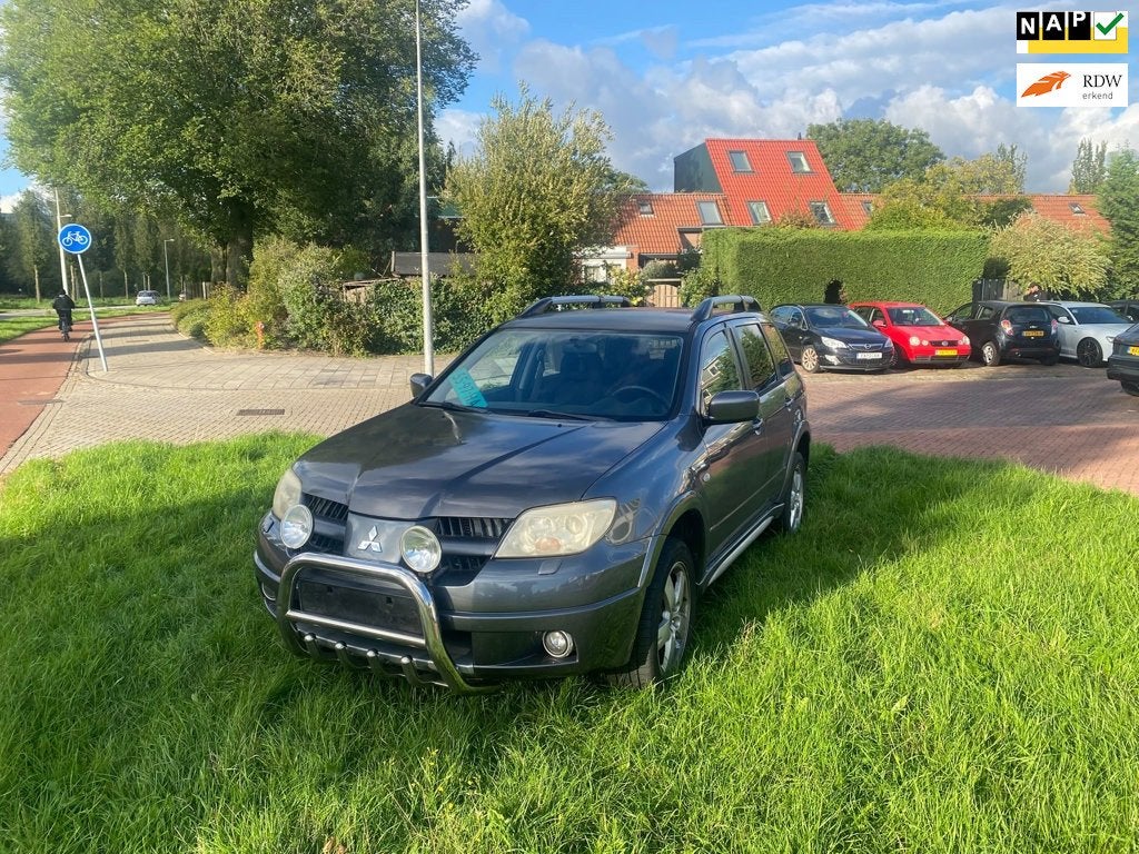 Mitsubishi Outlander Sport 2.4 Invite Scott 4WD, Auto's, 4 cilinders, Bedrijf, Handgeschakeld, Metallic lak