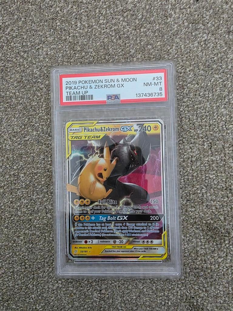 PSA 8 Pikachu & Zekrom GX Team Up #33 Pokémon Kaart, Ophalen of Verzenden, Zo goed als nieuw, Losse kaart