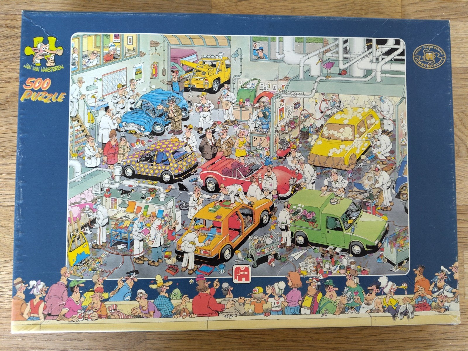 Jan van Haasteren puzzel 500 stukjes: In de autospuiterij, Hobby en Vrije tijd, Ophalen of Verzenden, 500 t/m 1500 stukjes, Gebruikt