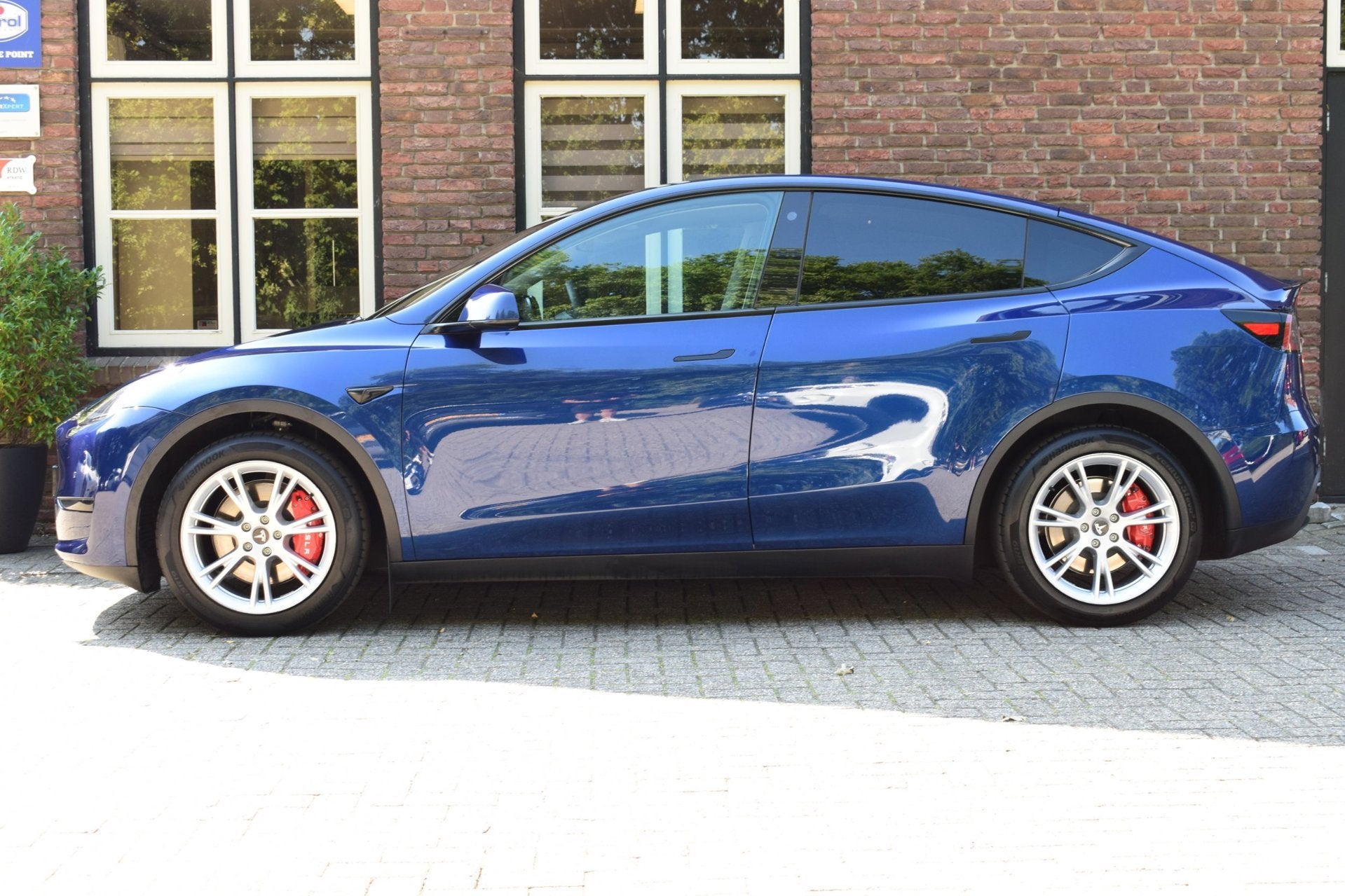 Foto 2 van Tesla Model Y RWD 58 kWh Trekhaak 91.2%SOH (1650kg Trekgewic