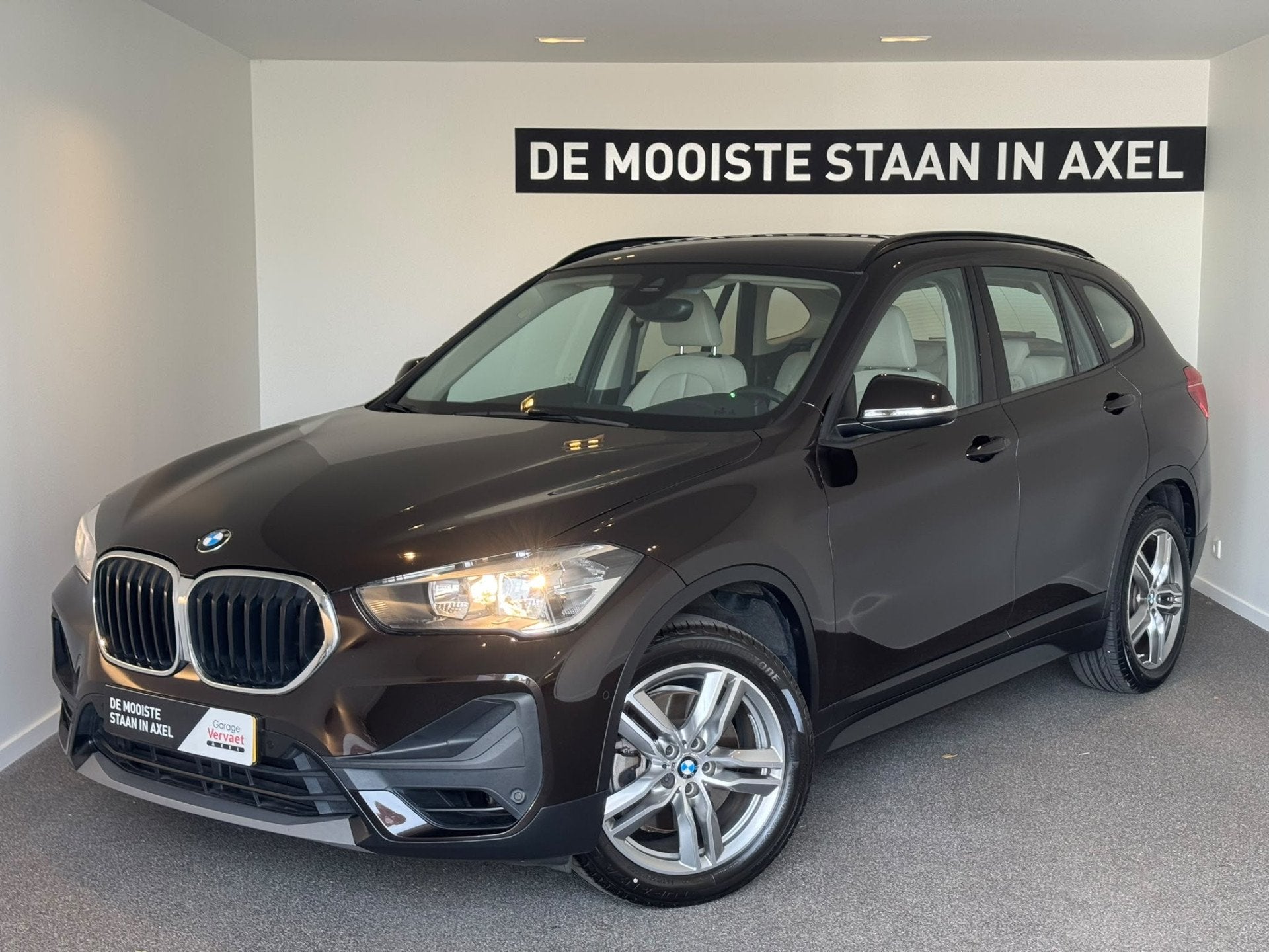 BMW X1 sDrive20i Executive Edition, Auto's, 1998 cc, Bruin, Leder, Bedrijf