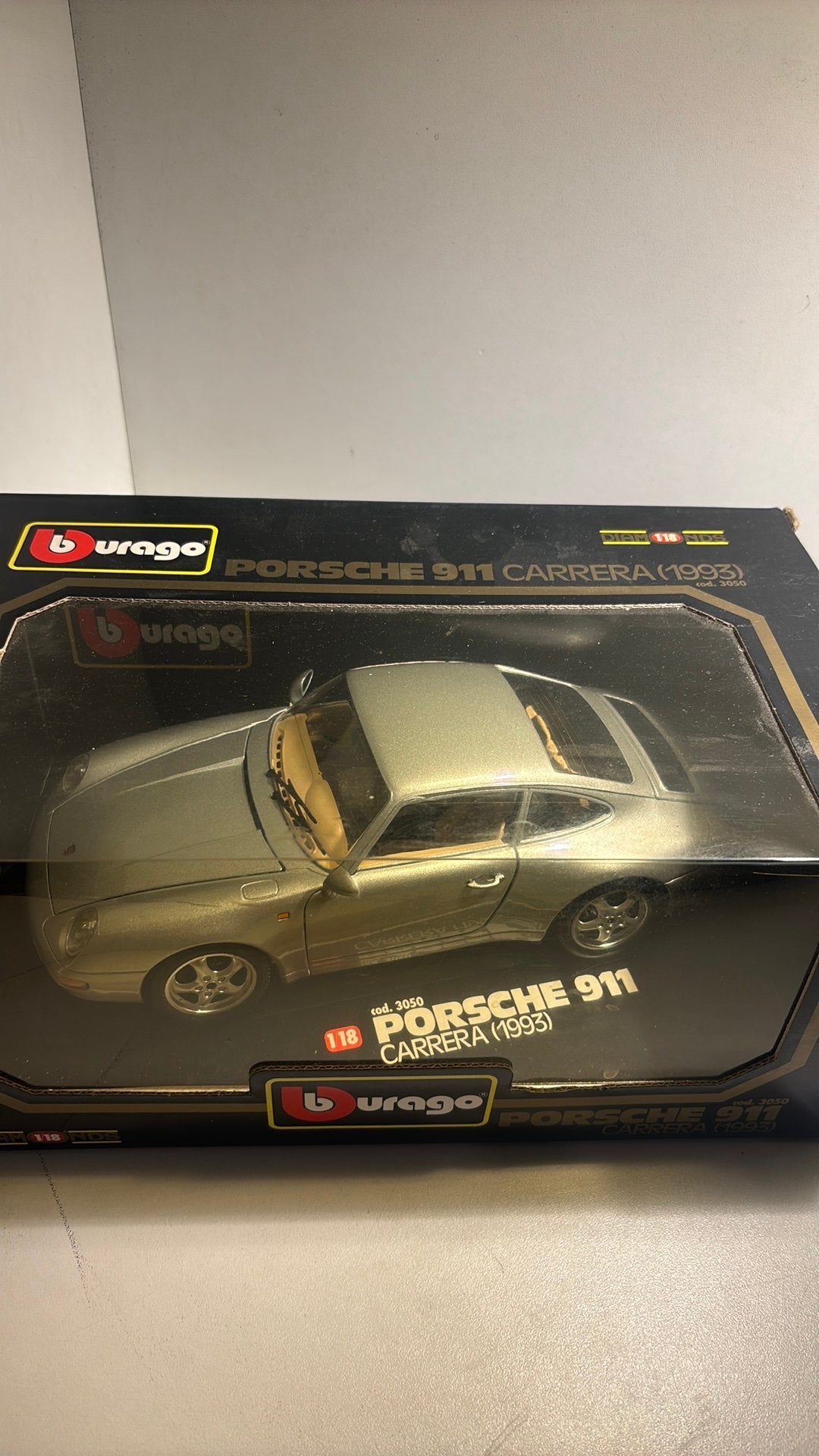 Porsche 911 carrera 1993 Bburago 1.18, Hobby en Vrije tijd, Ophalen of Verzenden, Bburago, A, A
