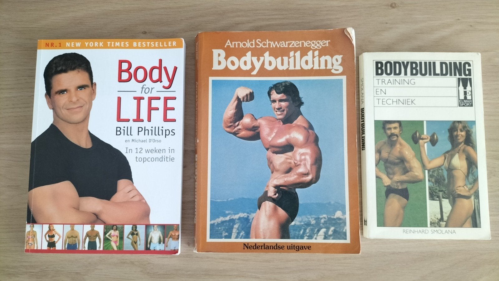 Bodybuilding Boeken, Ophalen of Verzenden, Gelezen, Bill Phillips, Arnold Schwarzenegger, Reinhard Smolana, Fitness
