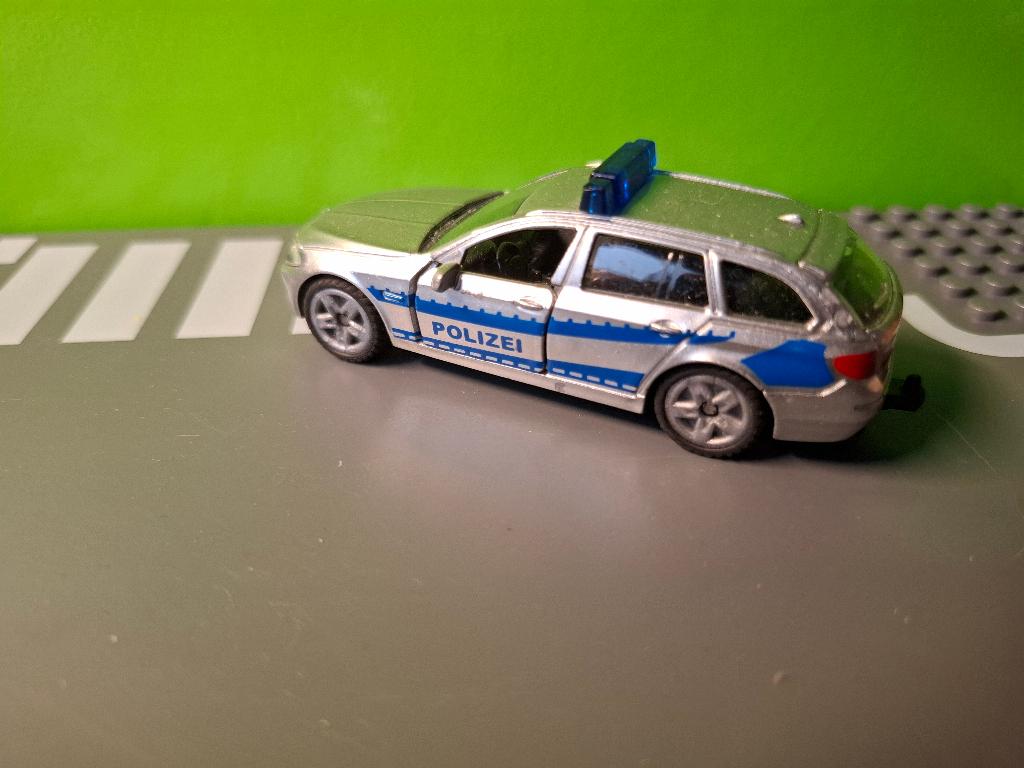 Siku 1401 - BMW 520i Touring Polizei [zilver] 1/55, Hobby en Vrije tijd, Modelauto's | Overige schalen, Ophalen of Verzenden, Gebruikt
