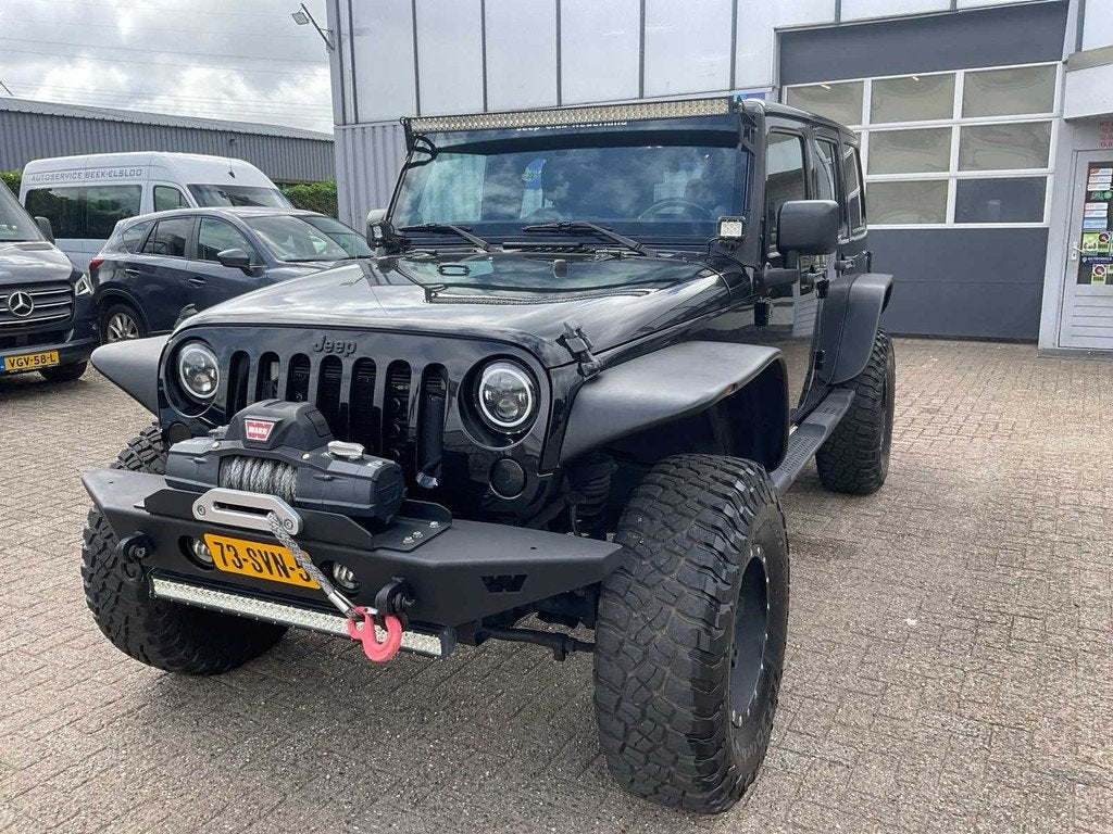 2011 Jeep Wrangler Unlimited 2.8 CRD Sport Personenauto, Auto's, Jeep, Euro 5, 450 kg, Gebruikt, 4 cilinders