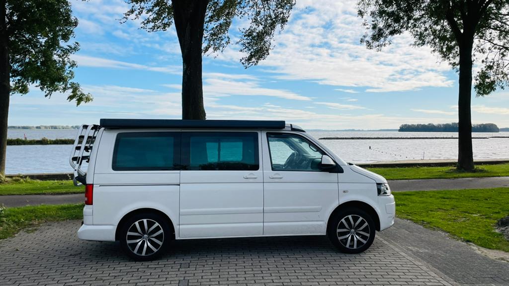 VW California T5 2.0 TDI Comfortline Milestone editie, Volkswagen, Luifel, Particulier, 4 tot 5 meter