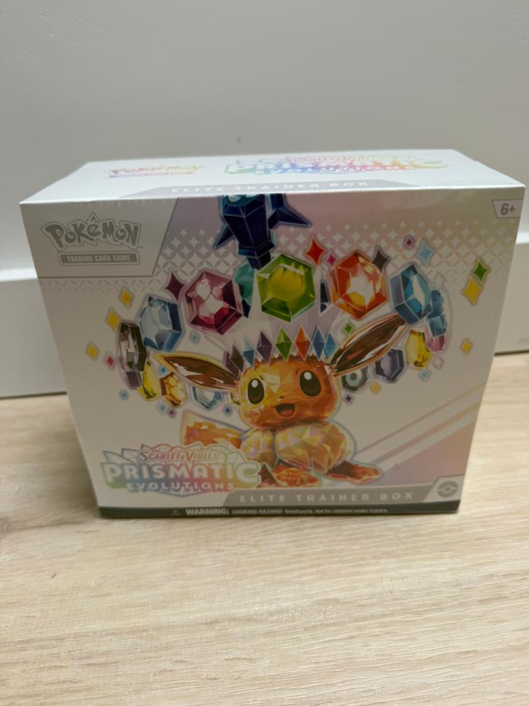 Prismatic evolutions ETB klein scheurtje in seal, Ophalen of Verzenden, Zo goed als nieuw