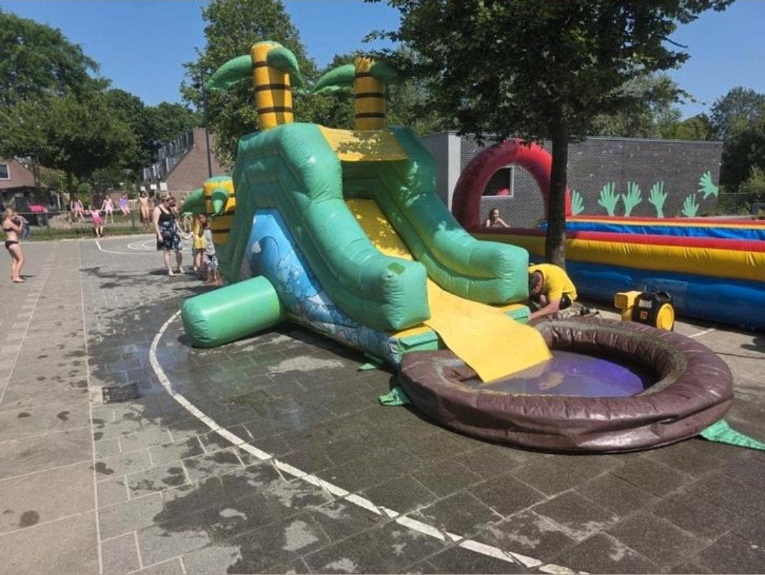 Water glijbaan springkussen zonder blower €450, Ophalen of Verzenden