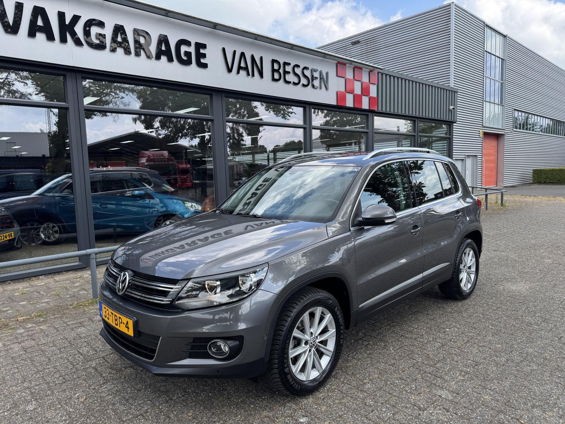 Volkswagen Tiguan 1.4 TSI Sport&Style LEDER-CLIMA-NAVI, Auto's, Voorwielaandrijving, Euro 5, 15 km/l, Zwart
