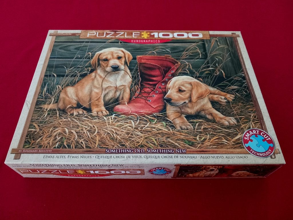 Eurographics puzzel 1000 stukjes met puppies en laars, Ophalen of Verzenden, 500 t/m 1500 stukjes, Zo goed als nieuw