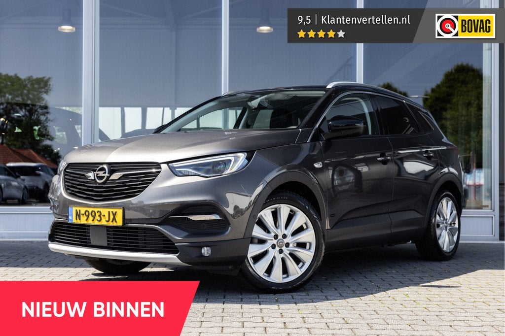 Opel Grandland X 1.6 Turbo Hybrid4 Ultimate | Trekhaak | Cam, Auto's, Opel, 12 maanden, 77 km/l, 4 cilinders, Leder en Stof