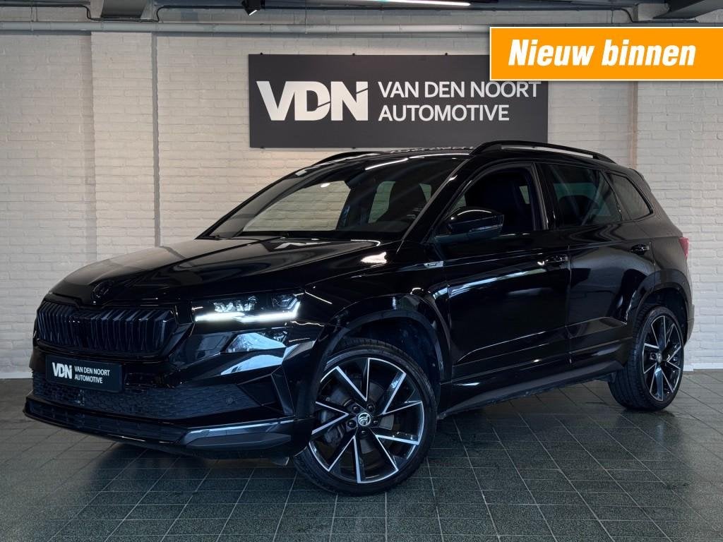 Skoda KAROQ 1.5 TSI Sportline Business DSG DCC Stoel-/stuurv, Automaat, Verwarmde buitenspiegels, 4 cilinders, Zwart