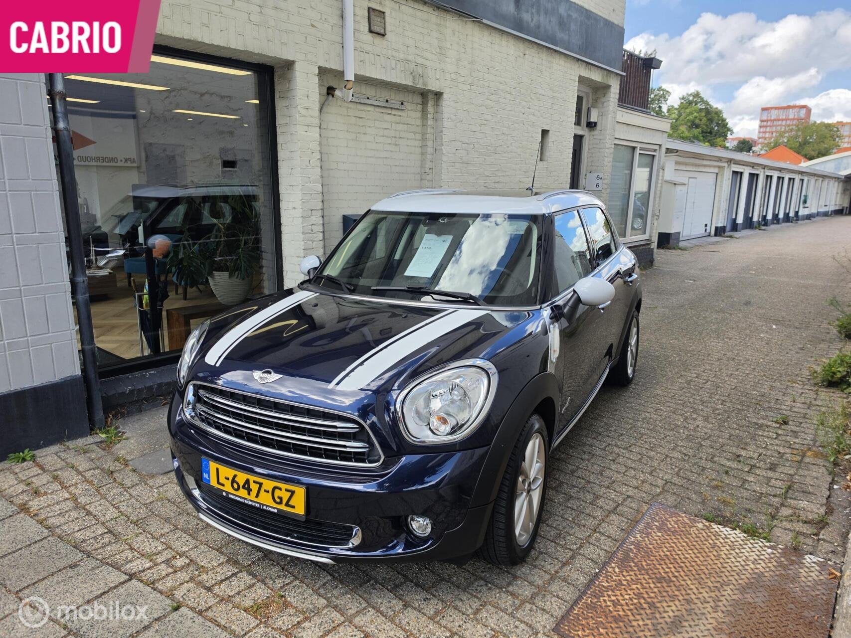 Mini Countryman 1.6 Cooper ALL4 AUTOMAAT, Auto's, Gebruikt, Blauw, 122 pk, Bedrijf