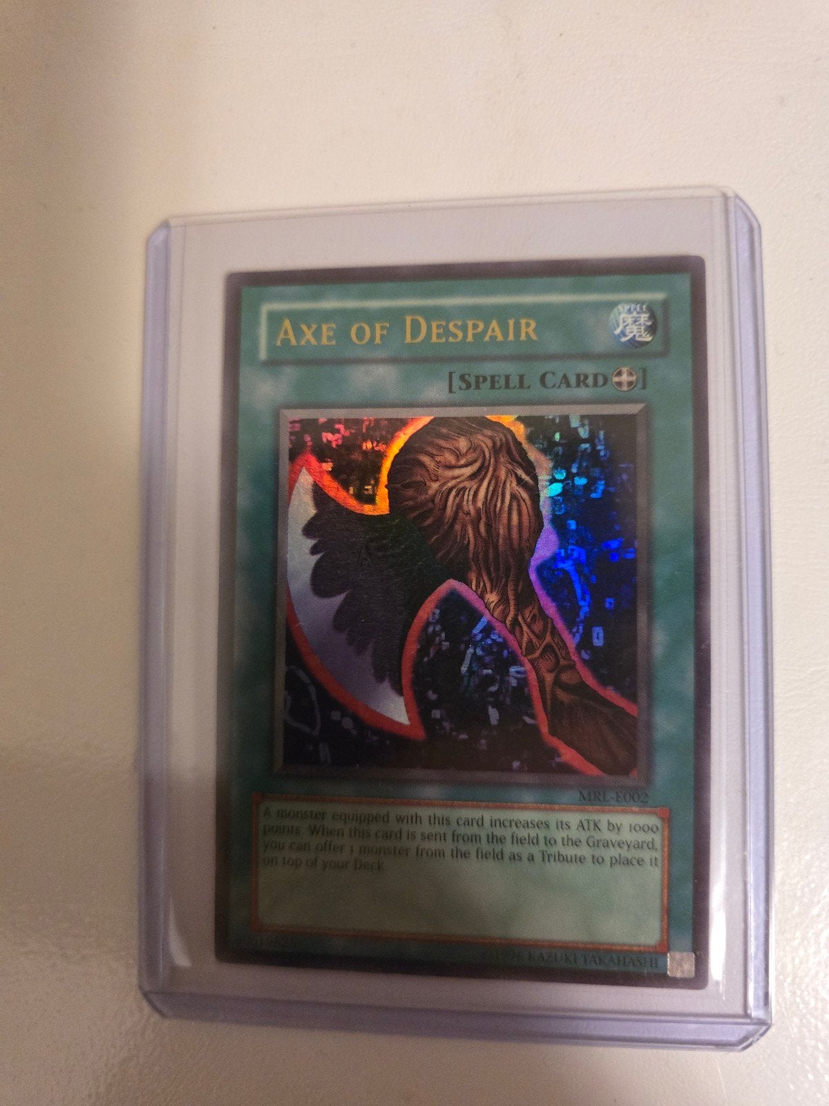 Yu-Gi-Oh! Axe of Despair MRL-E002 Spell Card Foil, Ophalen of Verzenden, Zo goed als nieuw, Losse kaart, Foil