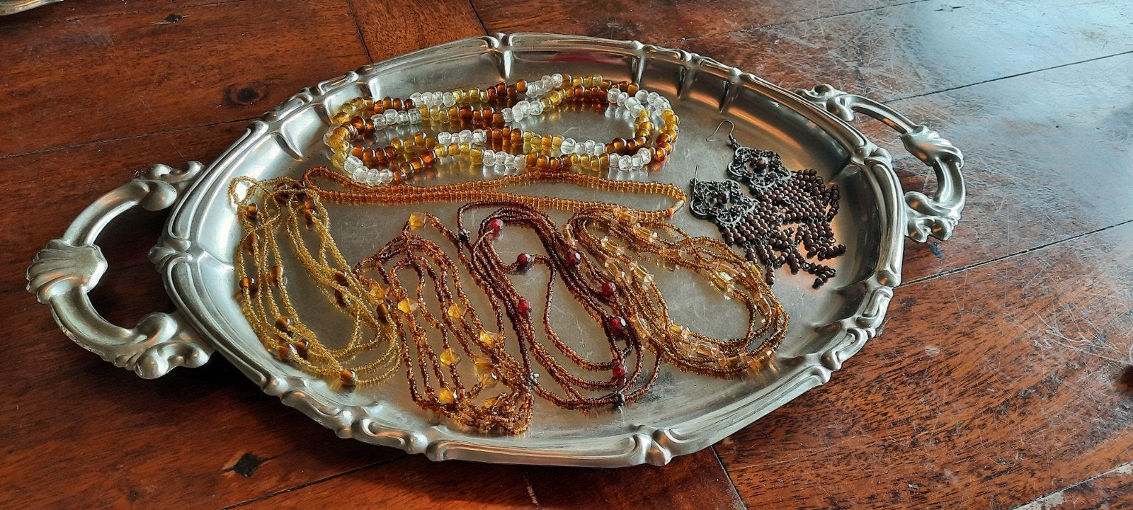 Lotje sieraden uit inboedel, Ophalen of Verzenden, Gebruikt, Bruin, Overige materialen