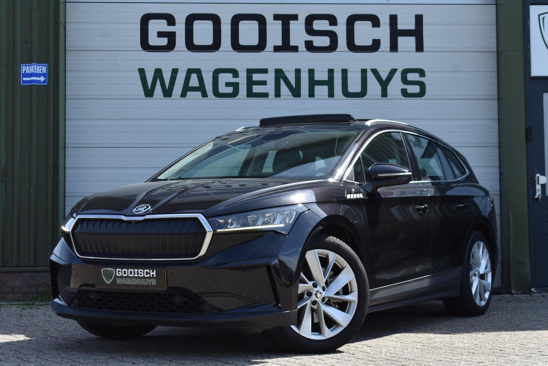 Skoda Enyaq iV 80 | Trekhaak | Pano | Camera | Stoel/Stuurve, Auto's, Achterwielaandrijving, Zwart, Origineel Nederlands, 204 pk