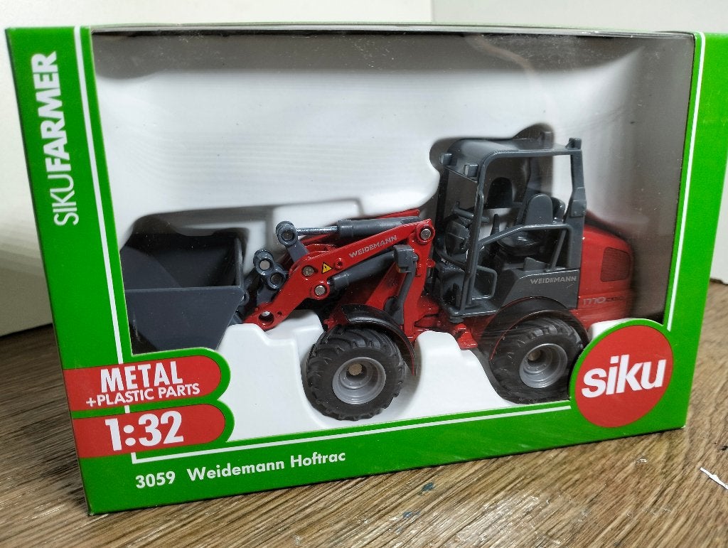 Te koop Siku Weidemann Hoftrac 1770 CX50 shovel aanbieding., Ophalen of Verzenden, Nieuw, Tractor of Landbouw, SIKU