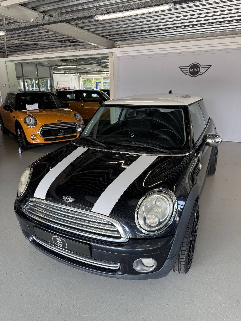Mini 1.6 Cooper 2007 Zwart ( 3 MAANDEN GARANTIE ), Auto's, Voorwielaandrijving, Stof, 4 cilinders, 4 stoelen