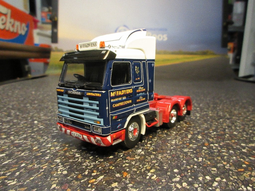 Tekno Scania 143 McFadyens met certificaat, Hobby en Vrije tijd, Modelauto's | 1:50, Ophalen of Verzenden, Nieuw, Bus of Vrachtwagen