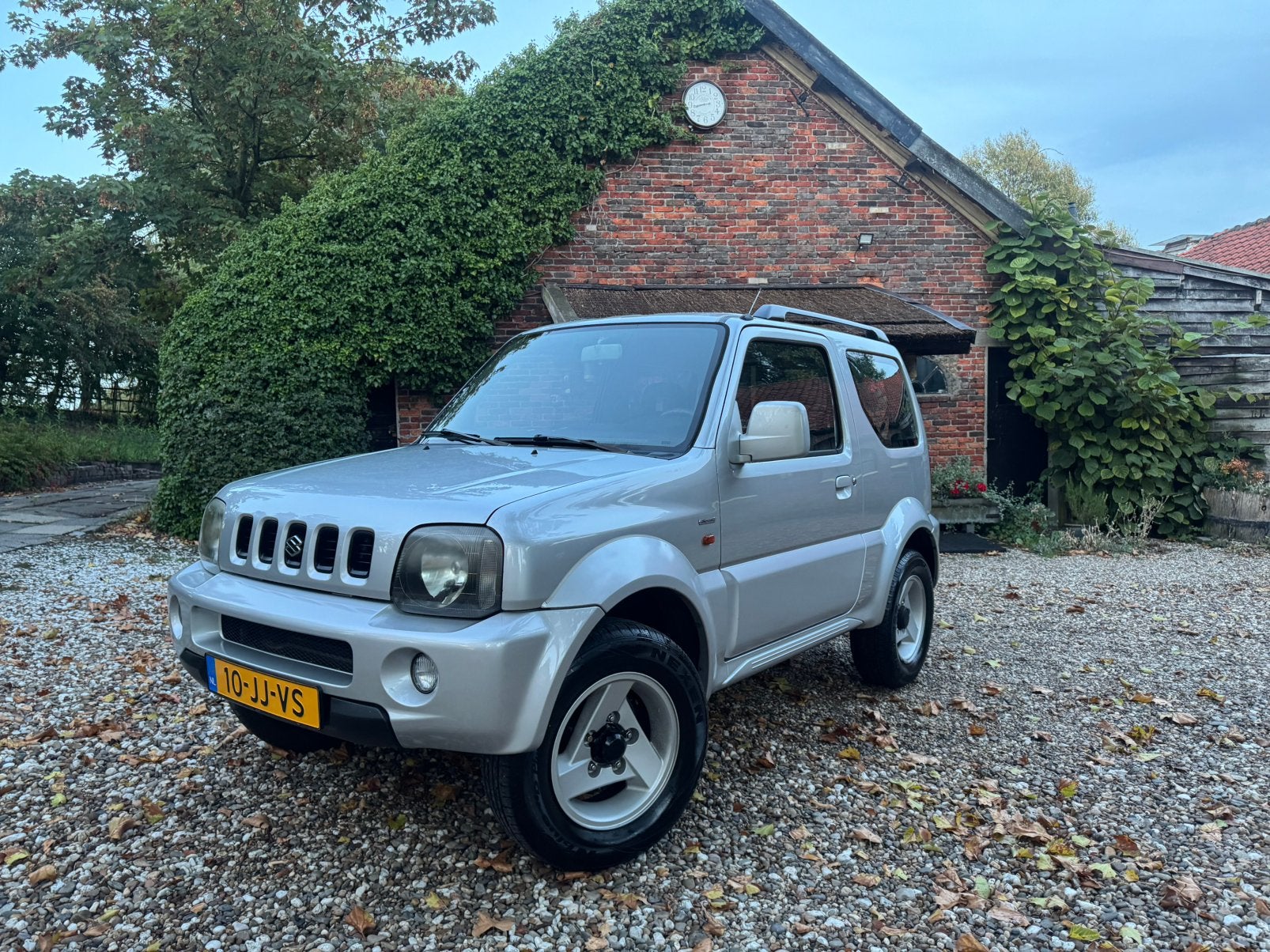 Suzuki Jimny 1.3 JX 4WD Special Edition Grijs, Metal top 4X4, 13 km/l, Stof, 40 €/maand, 4 cilinders