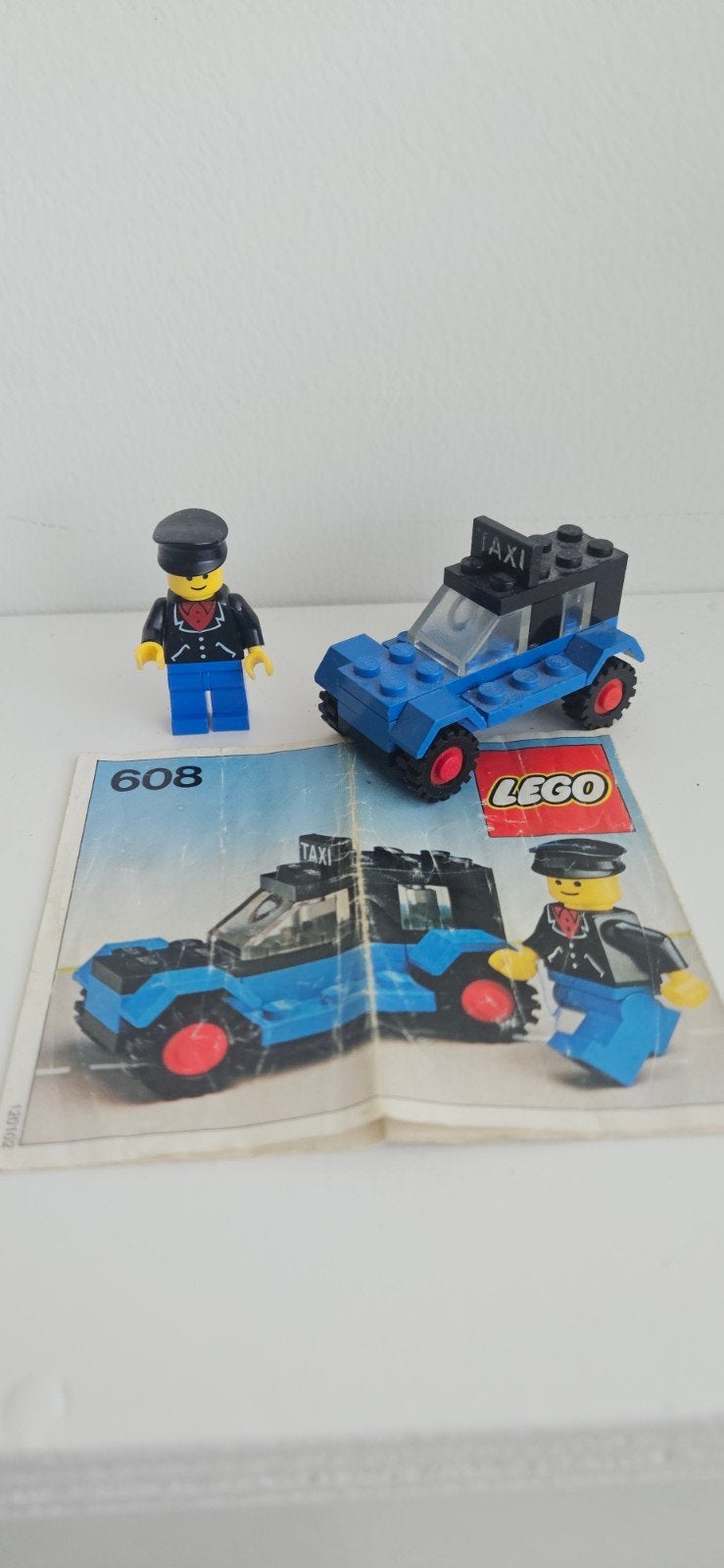 Vintage LEGO Taxi 608 met chauffeur en instructies, Ophalen, Gebruikt