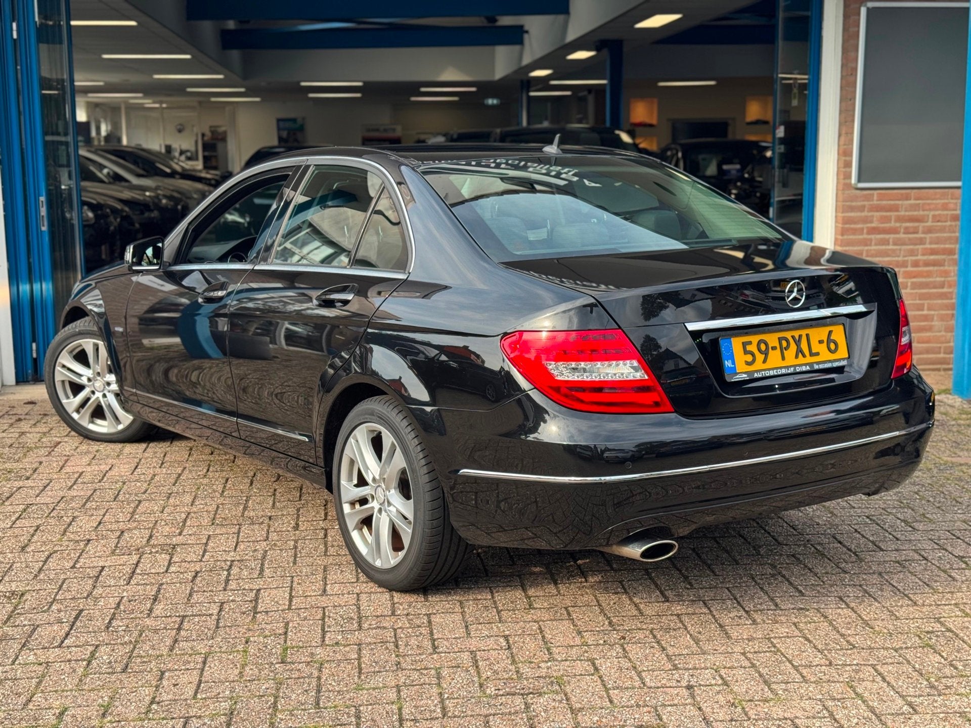 Mercedes-Benz C-klasse 180 Avantgarde 2011 AUT NAVI LM NAP!, Auto's, Automaat, Zwart, Zwart, Origineel Nederlands