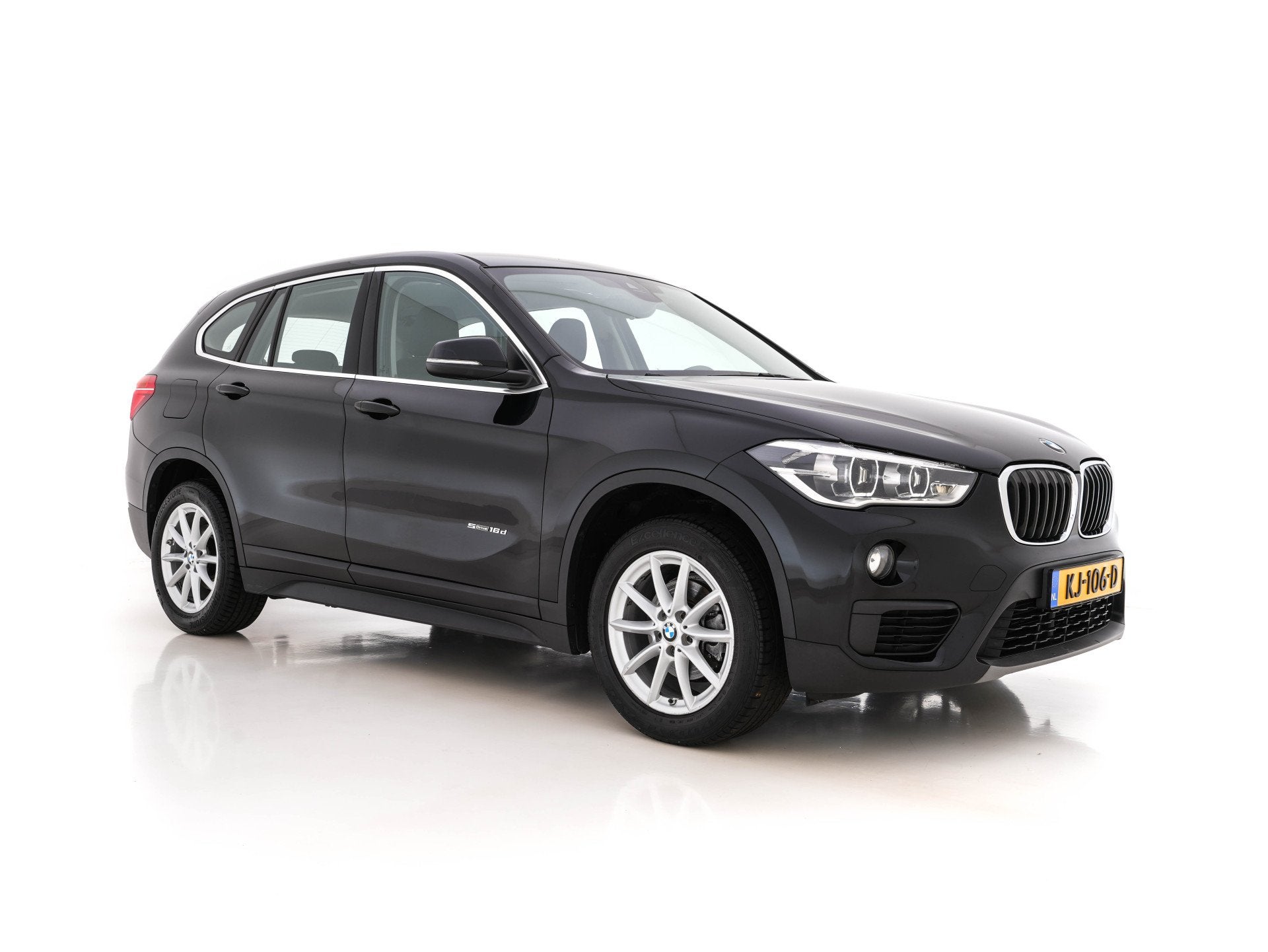 BMW X1 sDrive16d Centennial Executive *NAVI-FULLMAP | FULL-L, Auto's, Stof, Gebruikt, 116 pk, Zwart