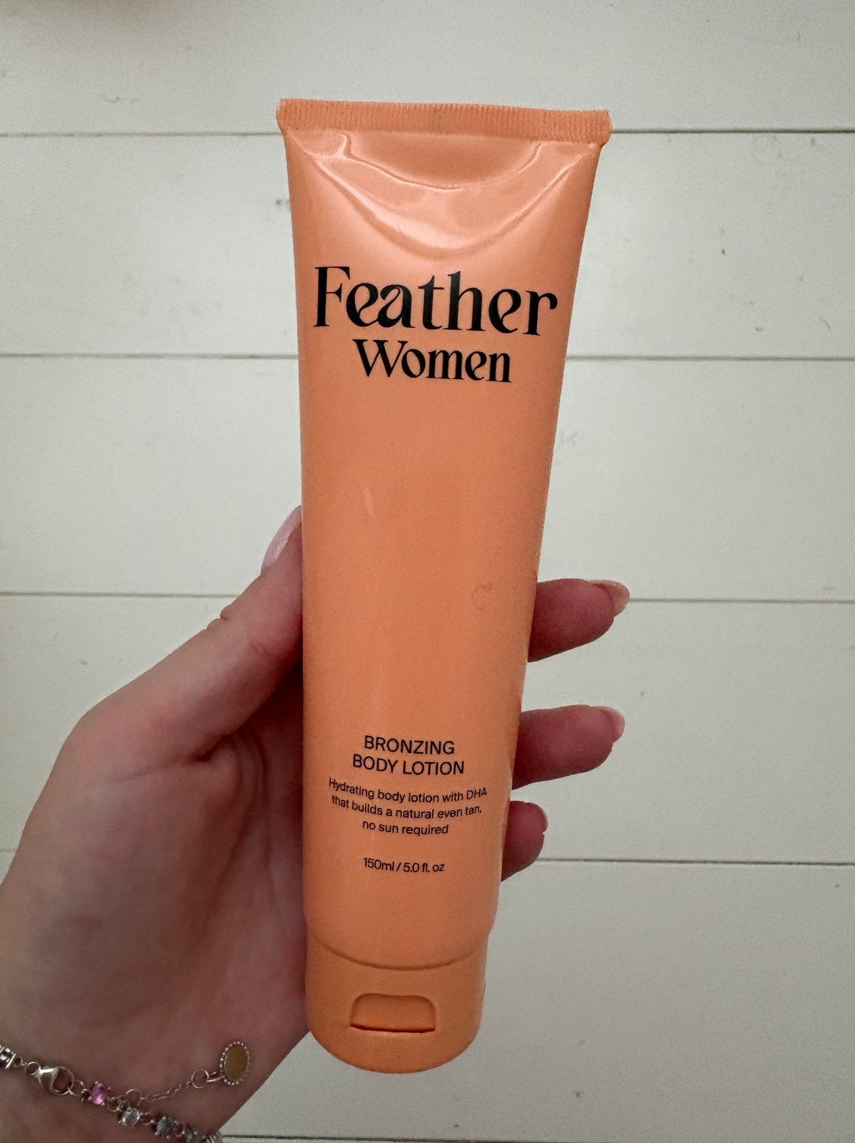 Feather Woman Bronzing Body Lotion - 1x gebruikt, Ophalen of Verzenden, Gebruikt, Bodylotion, Crème of Olie