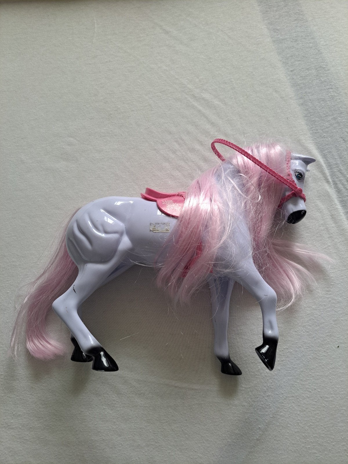Speelgoedpaard met roze manen en zadel, Ophalen of Verzenden, Gebruikt, Meisje
