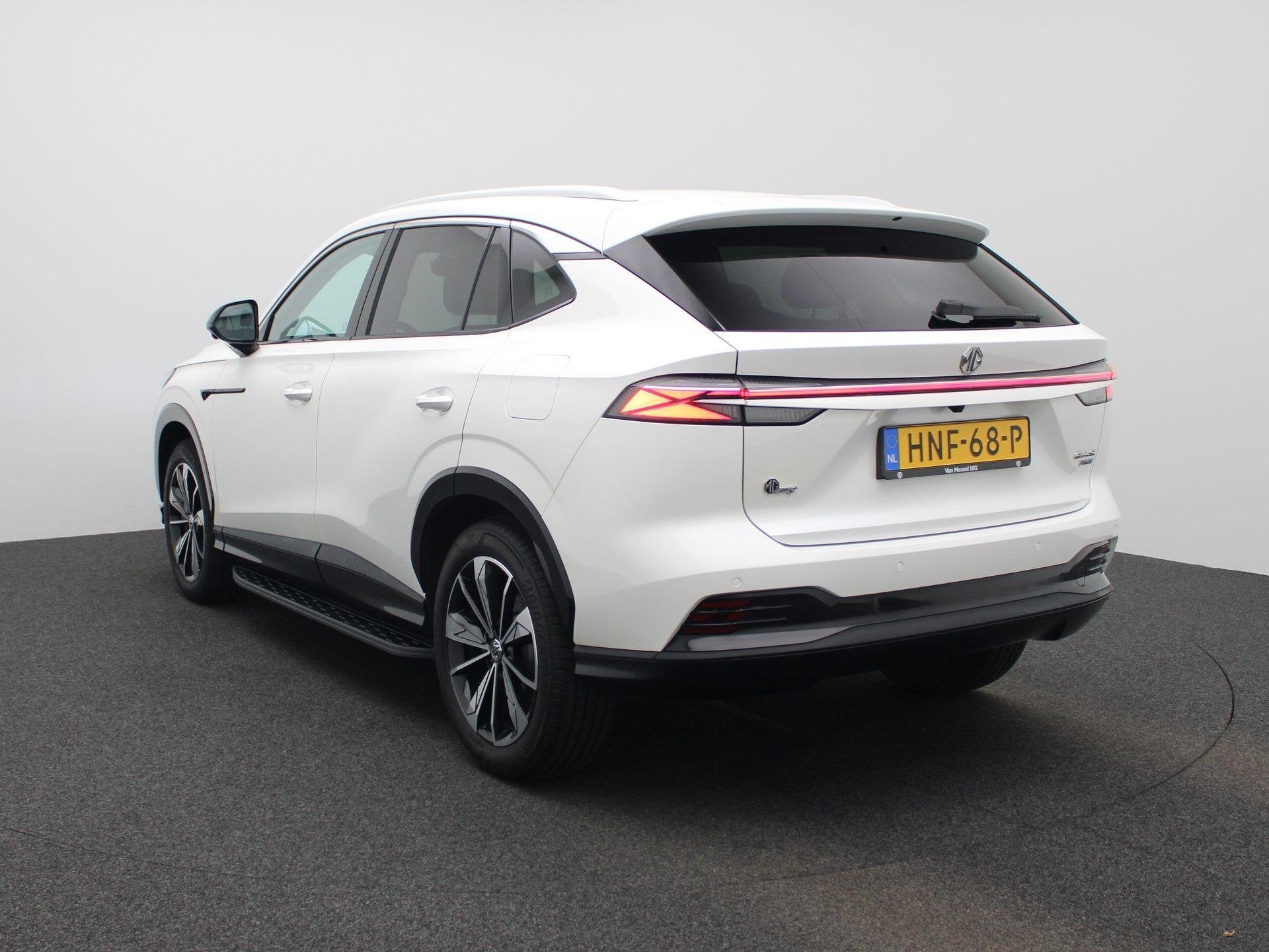 MG HS PHEV 1.5 272pk Aut. Luxury | 100km Electrisch | Navi |, Auto's, 12 maanden, Stof, Gebruikt, 4 cilinders