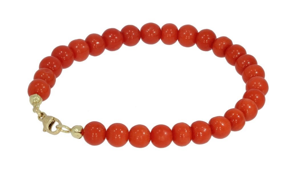 Bloedkoraal fraaie armband bol kralen 14k slot goud dame