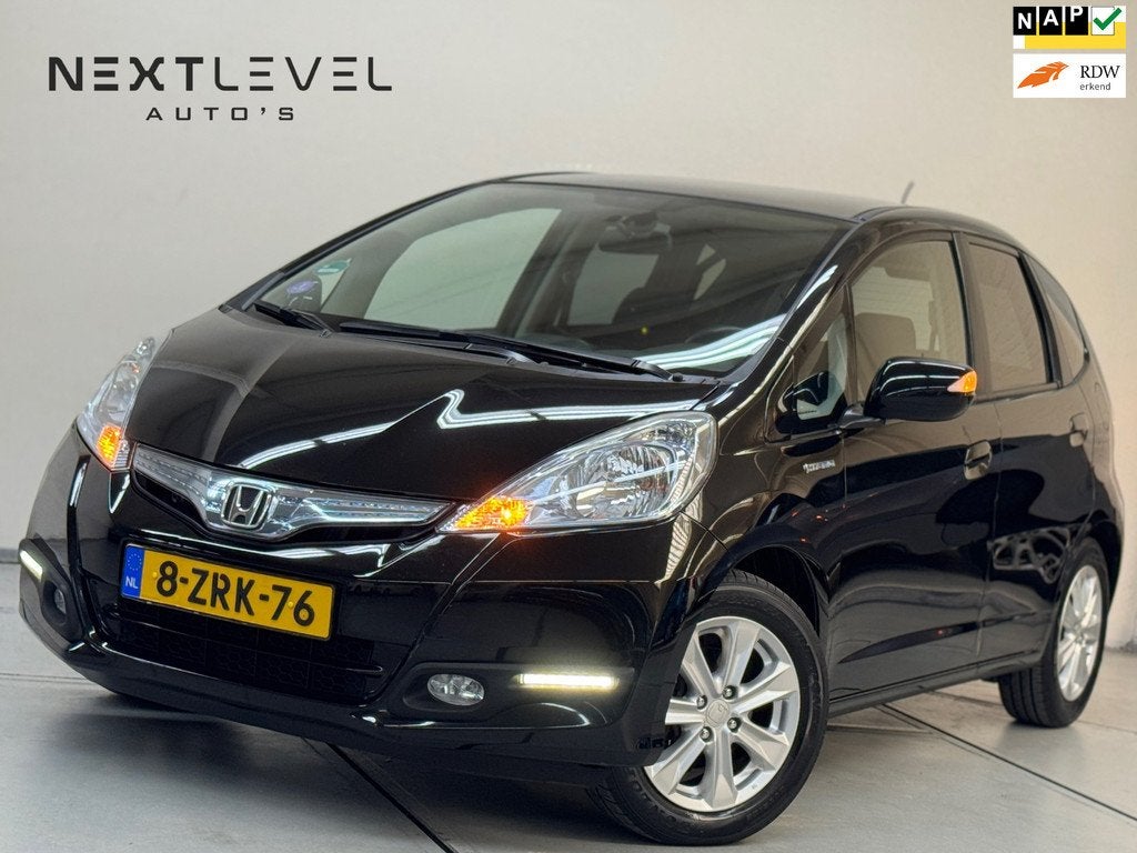 Honda Jazz 1.4 Hybrid Elegance Panoramadak DealerOnderhouden, Auto's, Euro 5, Gebruikt, 4 cilinders, Automatische klimaatregeling