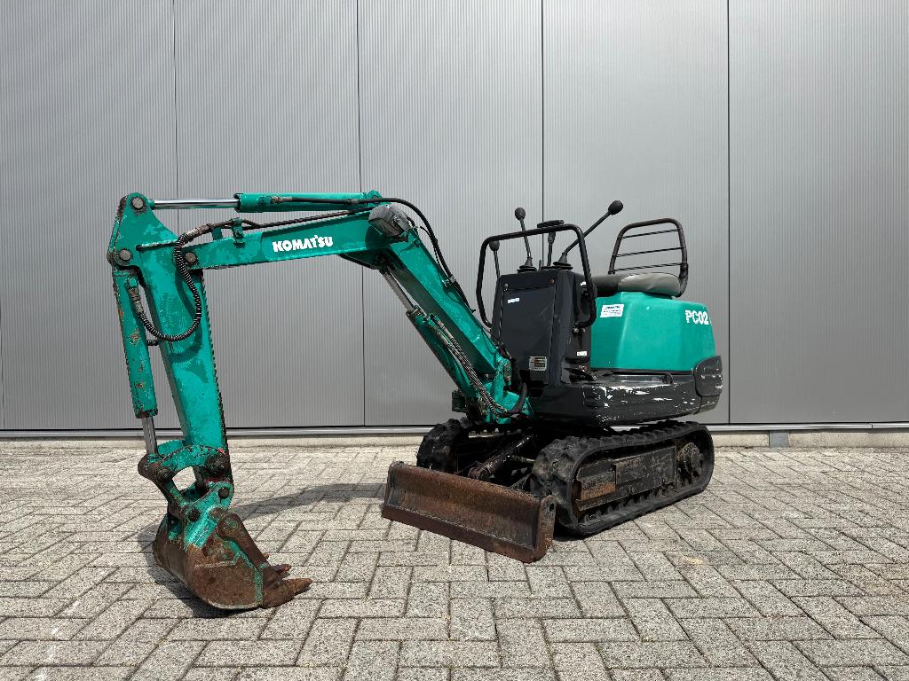 Komatsu PC-02 minigraver 500 kilo - gebruikt - goeie rupsen, Zakelijke goederen, Verzenden, Graafmachine