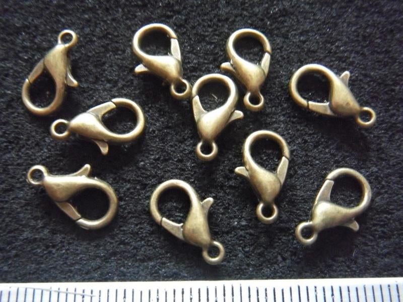 10 lobster slotjes 12x6mm. brons, Ophalen of Verzenden, Nieuw, Overige typen