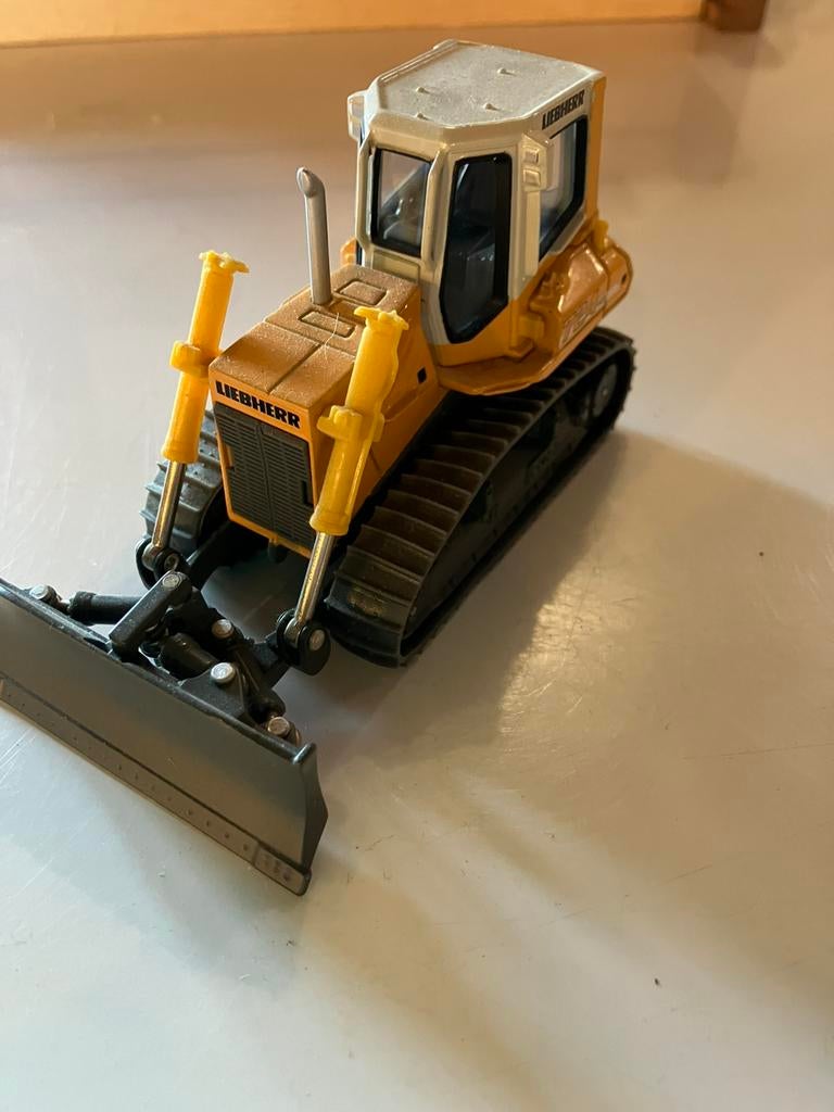 1:50 liebherr norscot 724 LPG bulldozers, Verzenden, Zo goed als nieuw, Hijskraan, Tractor of Landbouw, Conrad