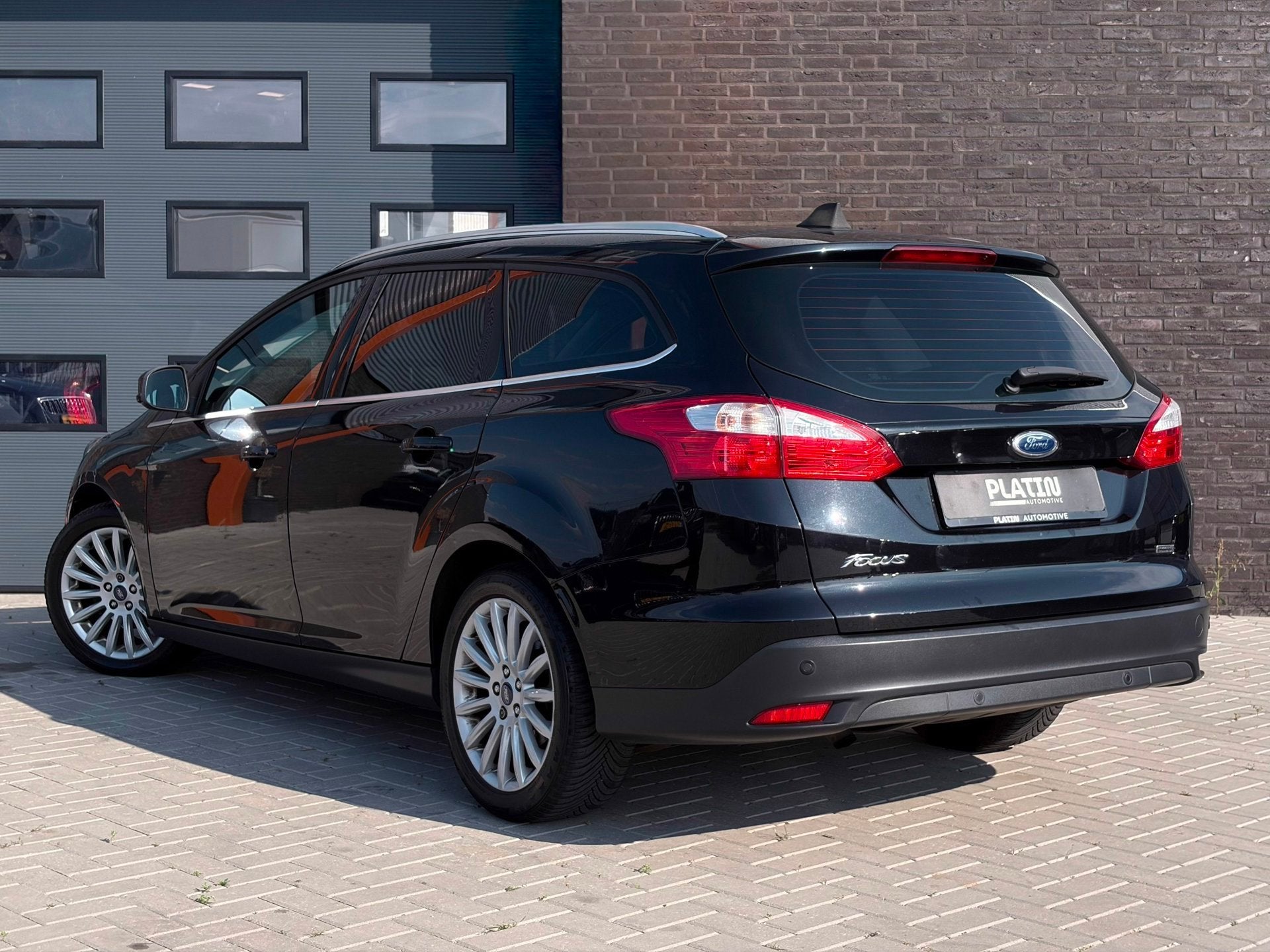 Ford Focus Wagon 1.0 EcoBoost Titanium|Cruise|NW Distr|APK, Euro 5, Gebruikt, Zwart, Zwart