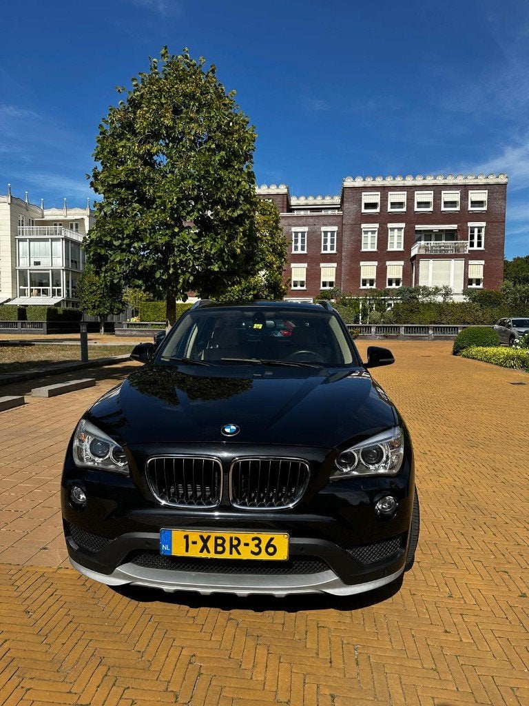 BMW X1 2.0 Sdrive 20I AUT 2014 Zwart, X1, 1800 kg, Beige, 4 cilinders