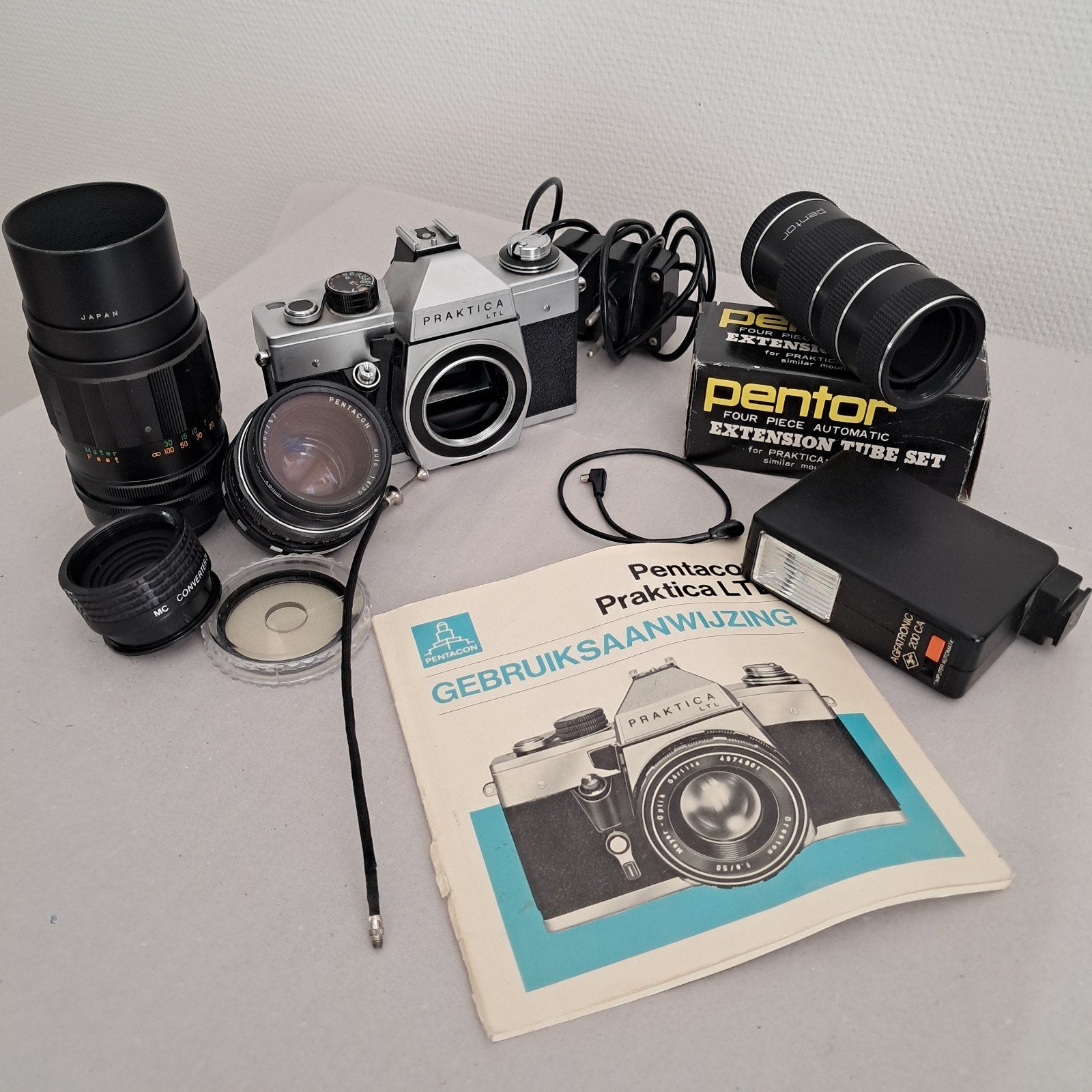 Praktica LTL Spiegelreflexcamera div. lenzen en access, Ophalen