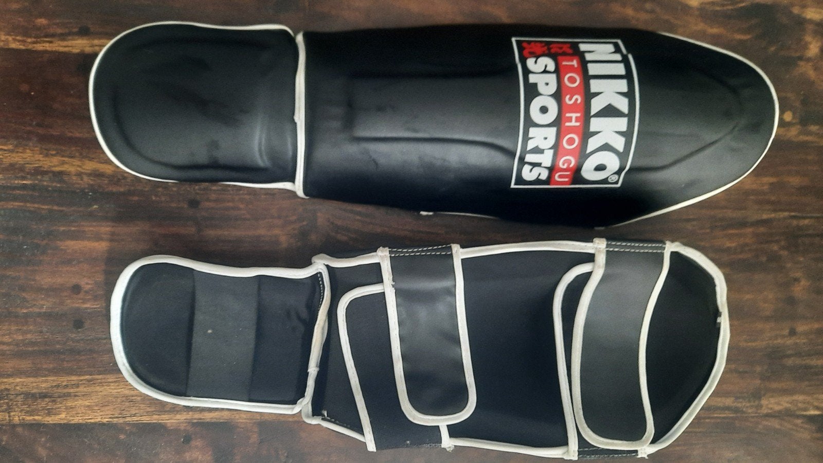 Nikko Sports Scheenbeschermers - Zwart, Sport en Fitness, Maat S, Ophalen of Verzenden, Gebruikt, Vechtsportbescherming
