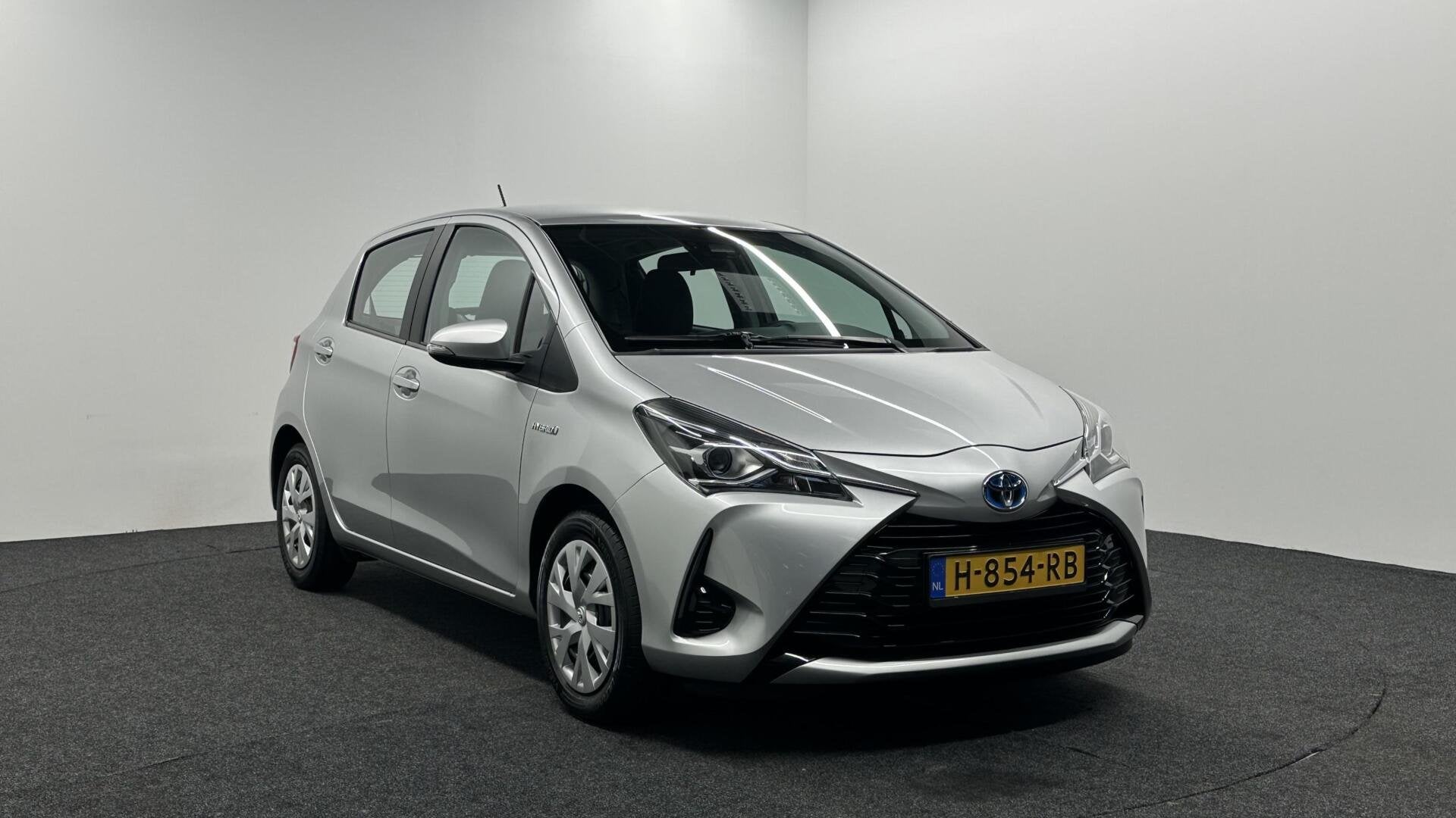 Toyota Yaris 1.5 Hybrid Dynamic ECC CRUISE CAMERA 66000 KM., Euro 6, 4 cilinders, Met garantie (alle), Origineel Nederlands