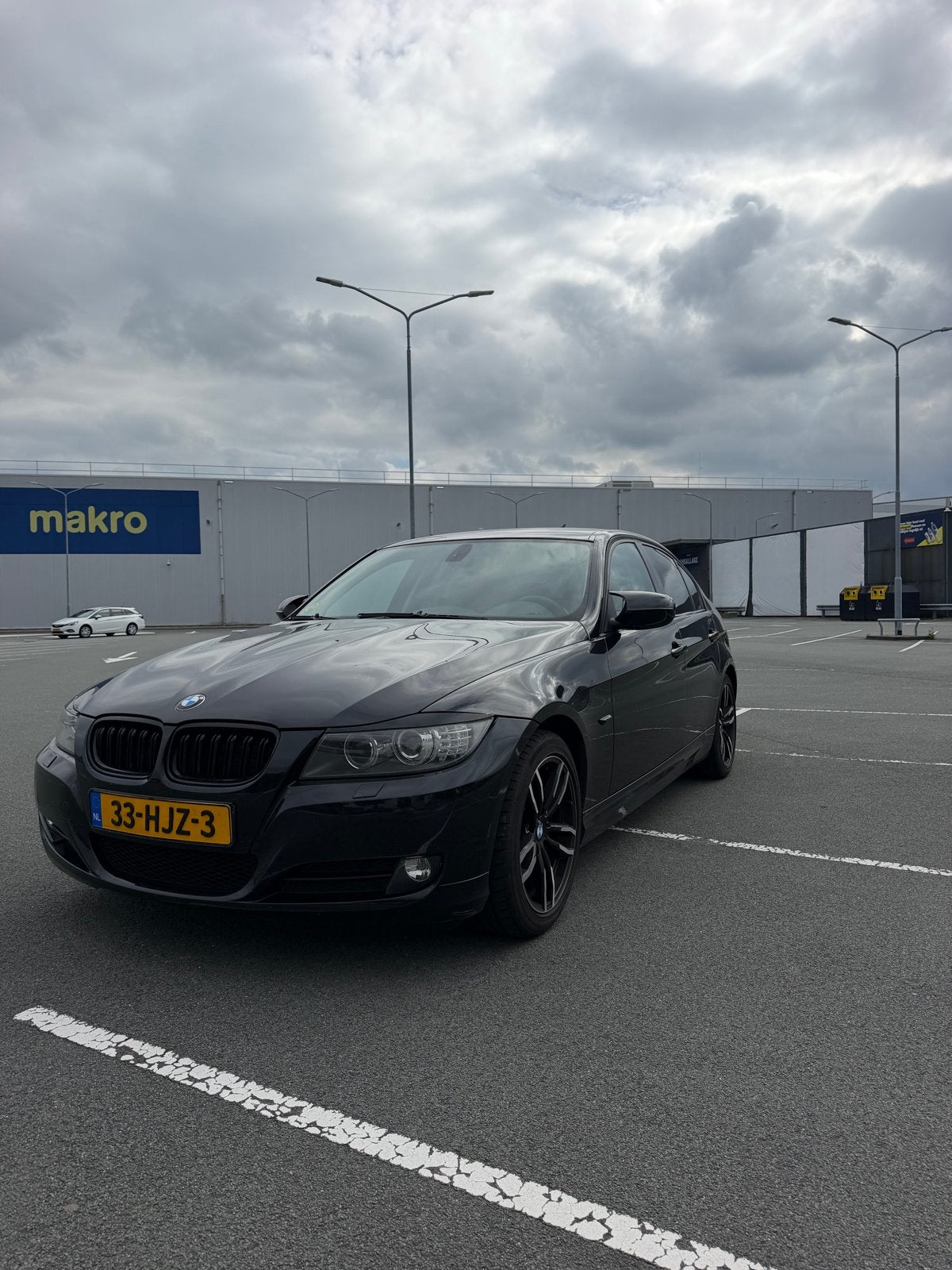 BMW 3-Serie 2.0 I 318 105KW 2009 Zwart, Auto's, Zwart, Zwart, Origineel Nederlands, Handgeschakeld