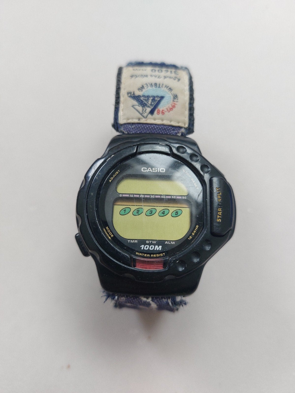 Casio 1176 Led 30 polshorloge met stoffen band, Ophalen, Casio, Kunststof, Gebruikt