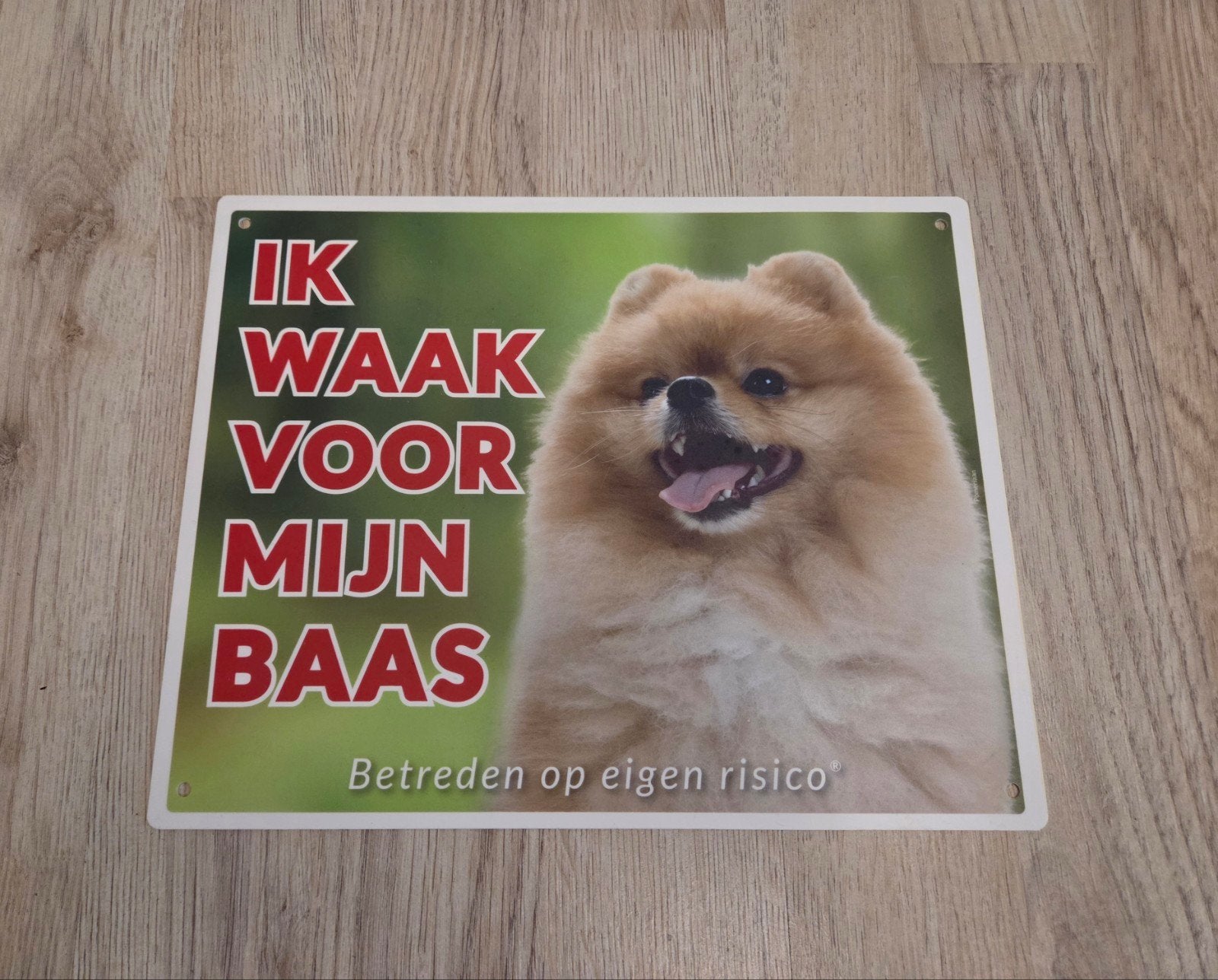 Waakbord met een Pomeriaan, Ophalen
