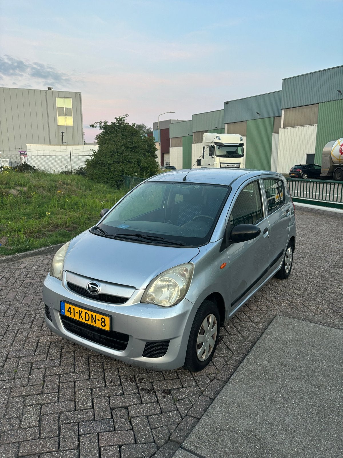 Daihatsu Cuore 1.0 5D 2009 Grijs, Auto's, Daihatsu, Voorwielaandrijving, Stof, 600 kg, 18 €/maand