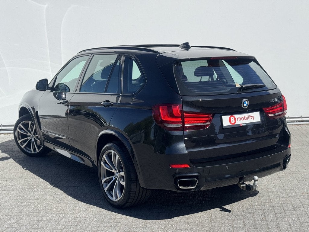 BMW X5 xDrive35i High Executive M-Sport NL Auto Trekhaak 350, Automaat, 2005 kg, Gebruikt, Automatische klimaatregeling
