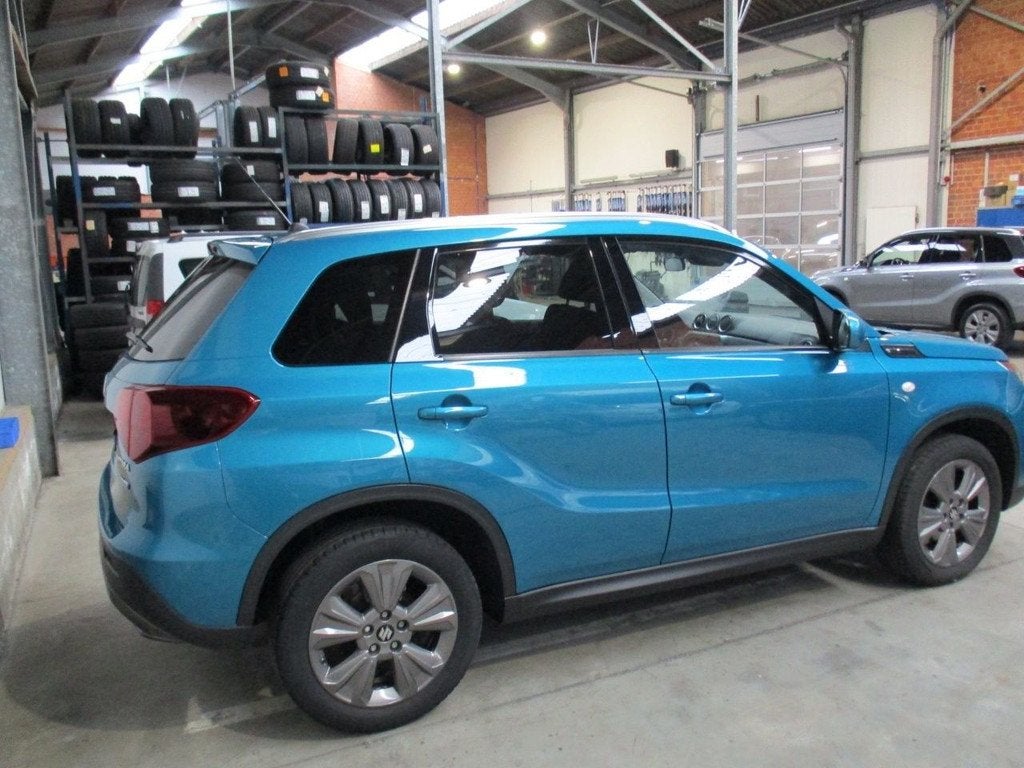 Suzuki Vitara 1.4 BOOSTERJET SELECT SMART HYBRID Navi | Came, Auto's, Suzuki, 12 maanden, Stof, Gebruikt, Zwart
