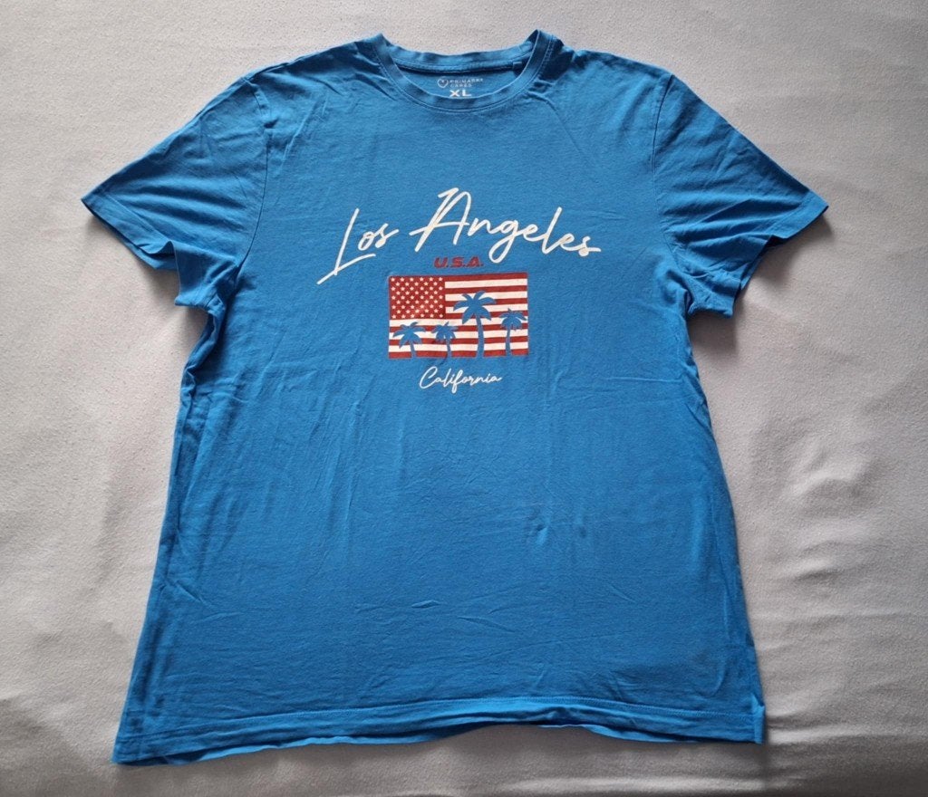 Te koop nieuw blauw T-shirt van Primark met print (maat: XL), Kleding | Heren, T-shirts, Blauw, Ophalen of Verzenden, Primark